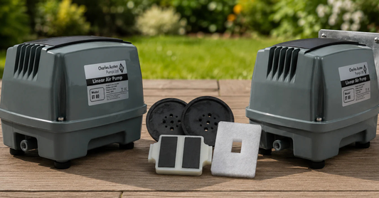 Charles Austen air pumps and water pumps with service kits, filters, diaphragms, and magnets displayed as essential components and maintenance parts.