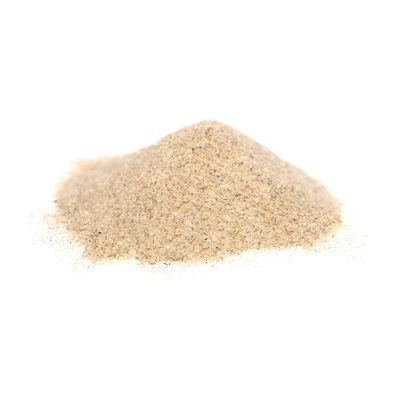 Pile_of_yellow_filtration_sand_on_a_white_background