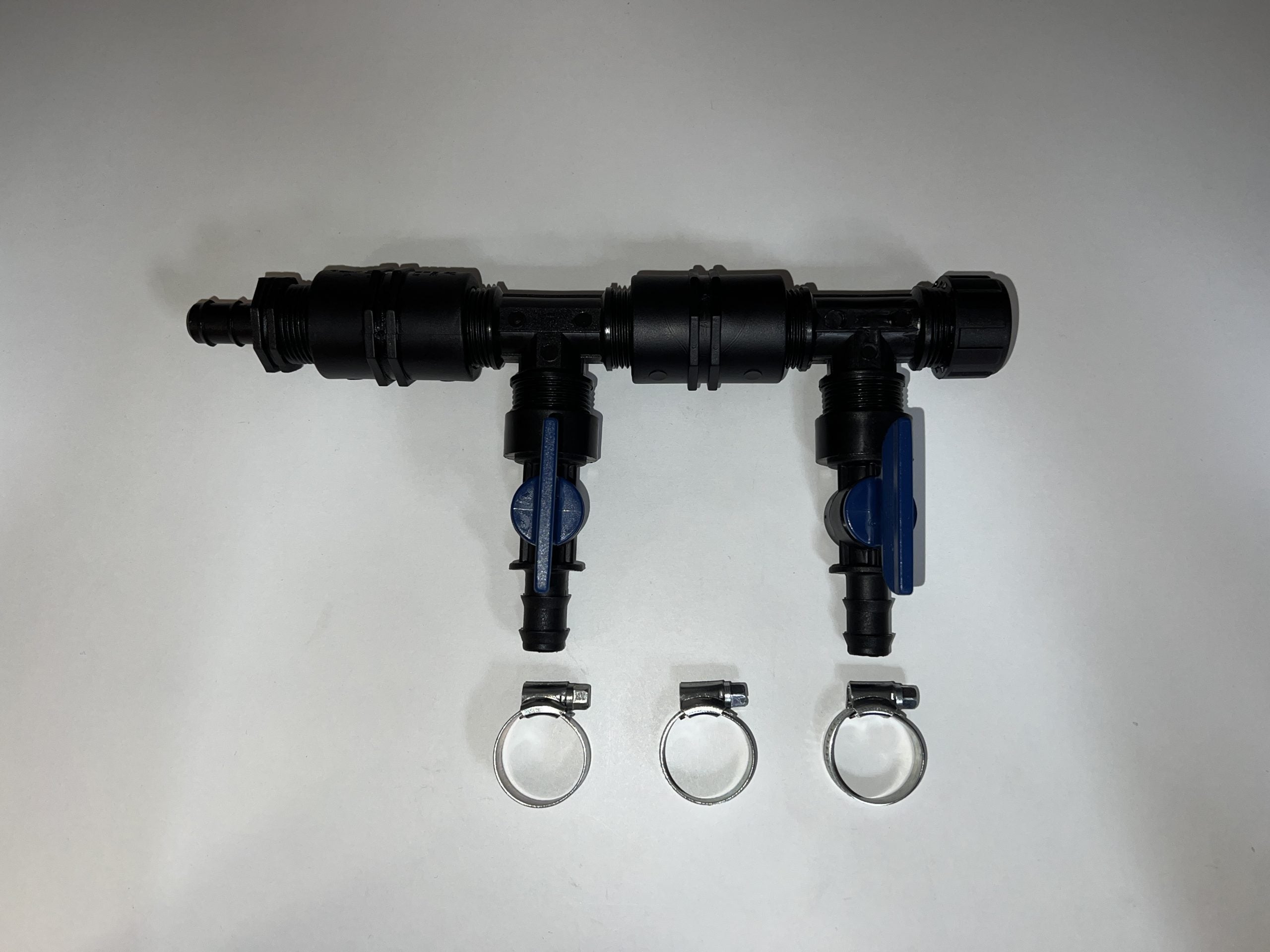 Hiblow 2-Way Manifold with inlet, dual outlet valves, end cap, and hose clips for aeration and air distribution systems.