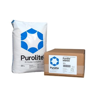 25_litre_white_Purolite_MB400_water_softening_resin_bag_next_to_brown_box_shaped_packaging_on_a_white_background