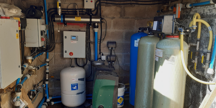 Waterwise pump installation in an outdoor sheltered supply area